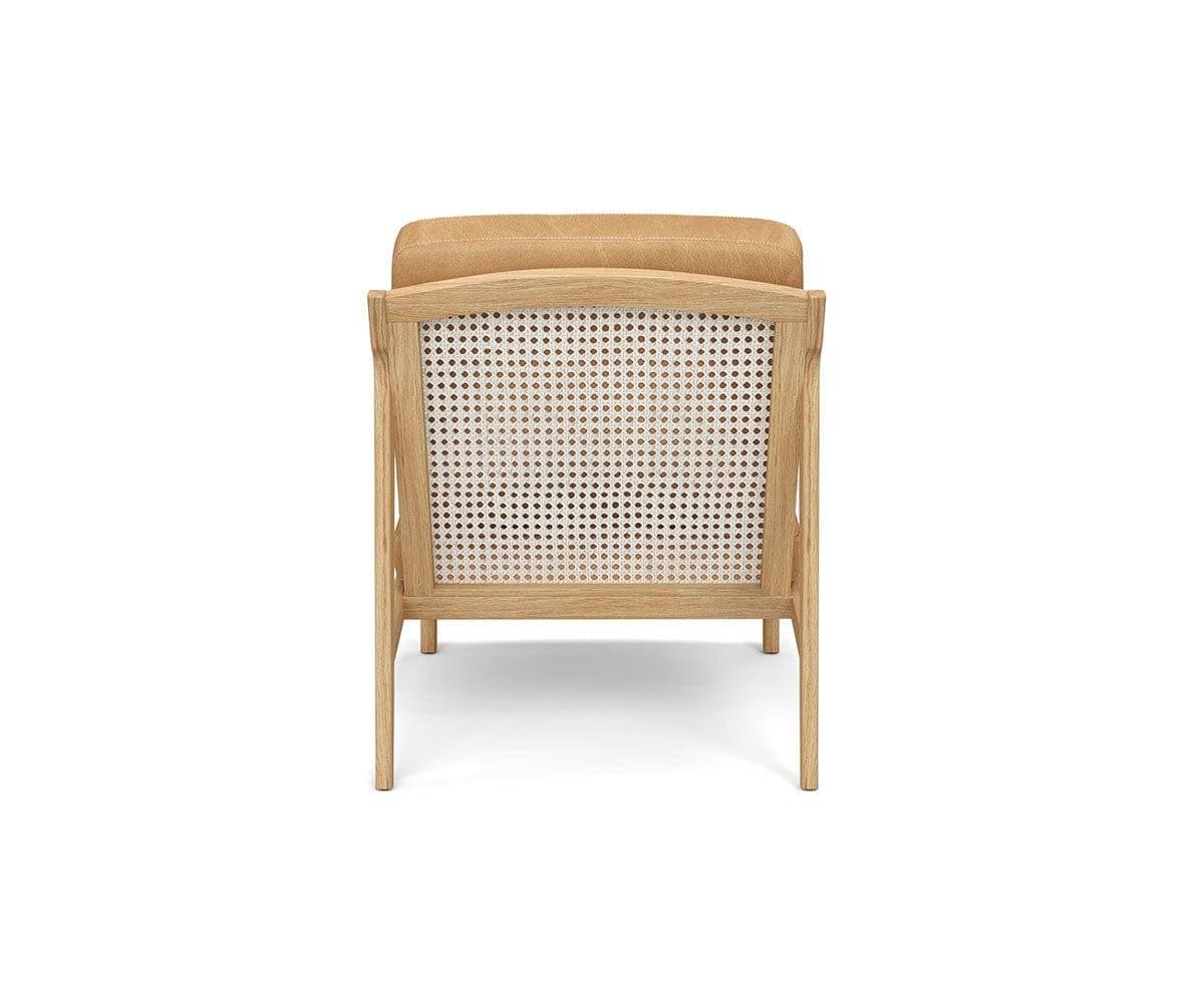 Fauteuil de salon en cuir avec dossier en rotin Bodie