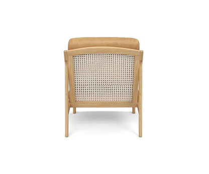 Fauteuil de salon en cuir avec dossier en rotin Bodie